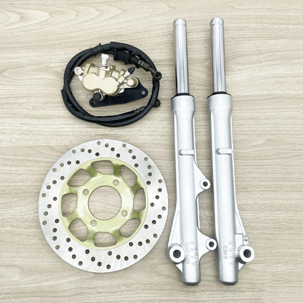 Wave 125/Wave 100s front disc brake conversion kit. Includes: front shocks, front disc, lower pump, speedometer gear set, disc brake hose, Wave 125 upper pump, disc brake rotor, and front caliper.