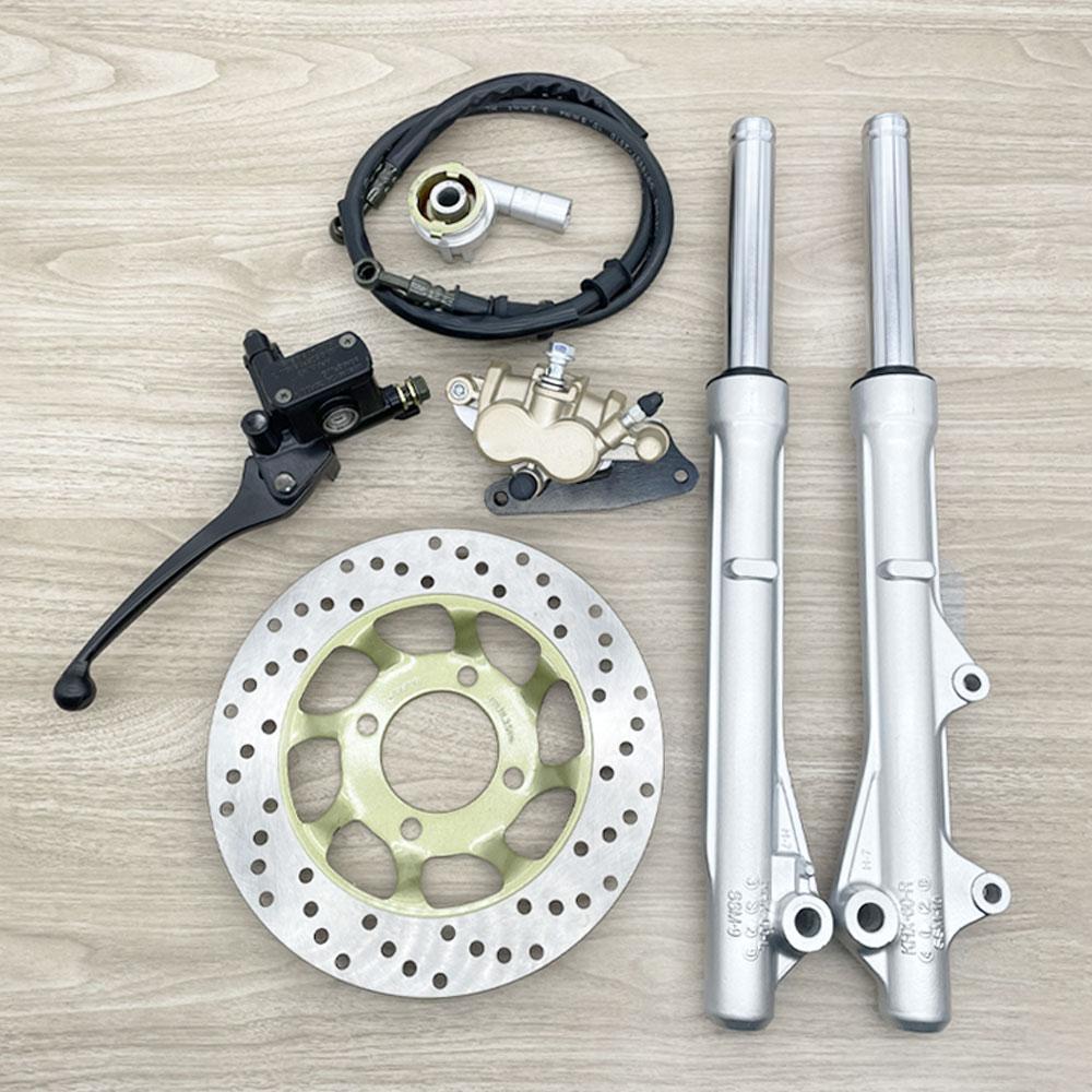 Wave 125/Wave 100s front disc brake conversion kit. Includes: front shocks, front disc, lower pump, speedometer gear set, disc brake hose, Wave 125 upper pump, disc brake rotor, and front caliper.